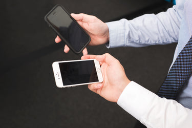 businessmen-hold-blank-iphone